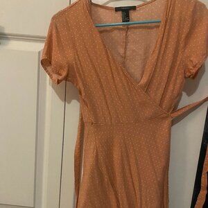 Pink polka dot wrap dress